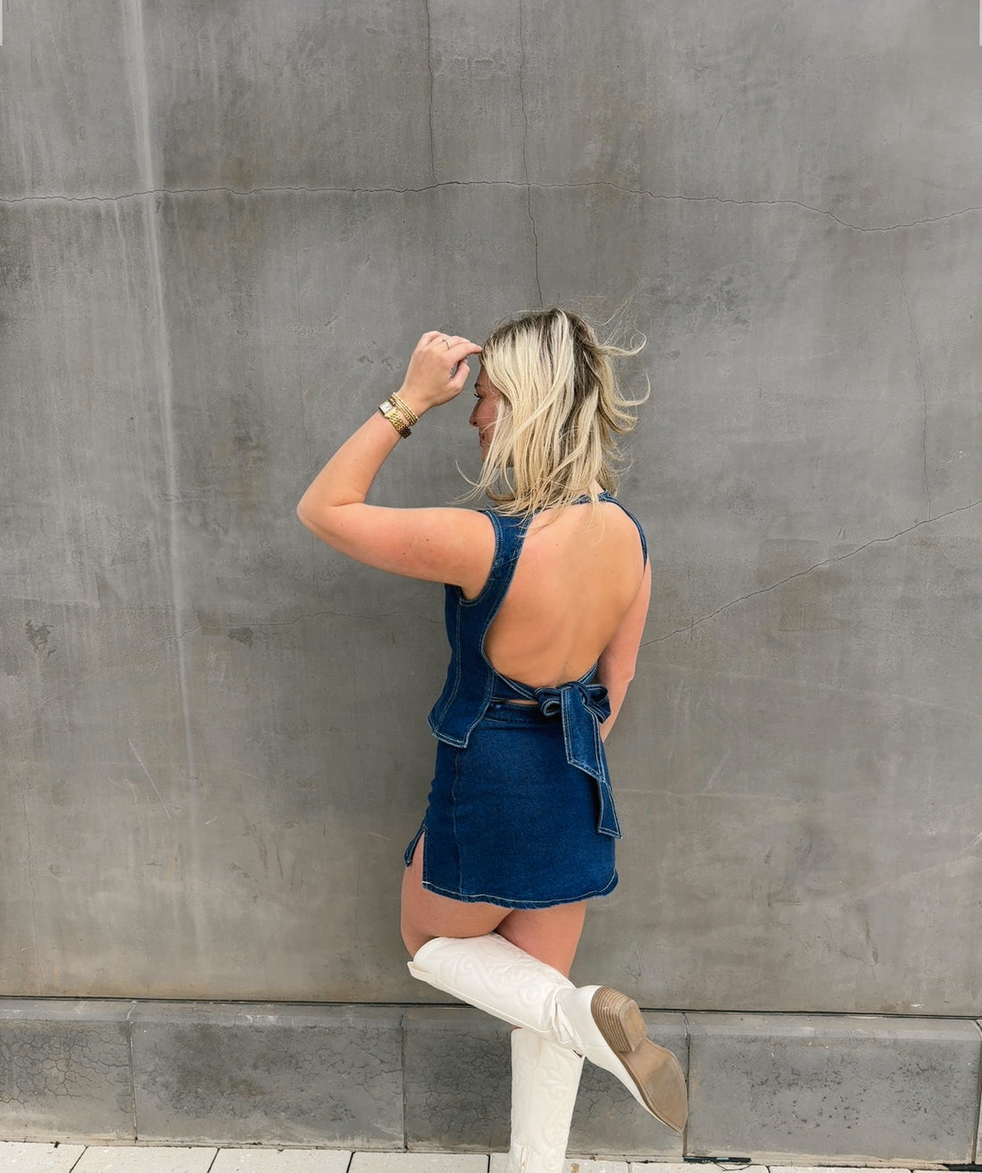 DENIM OPEN BACK TOP WITH BOW DETAIL AND MINI SKIRT